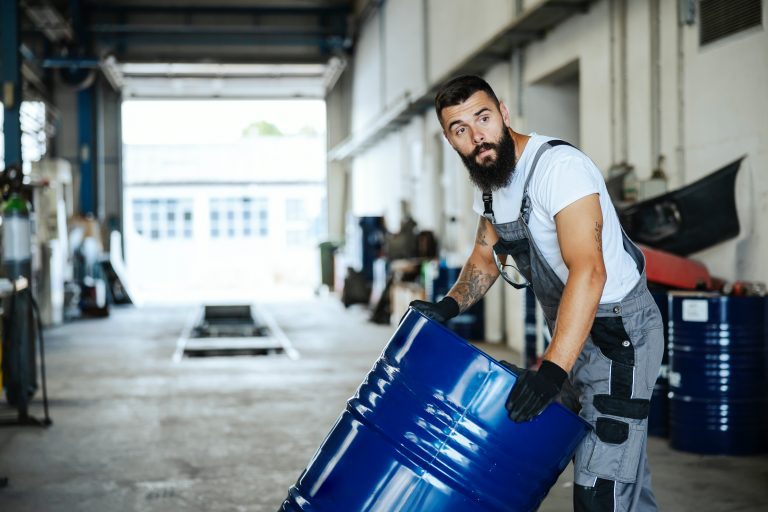 worker with fuel tank