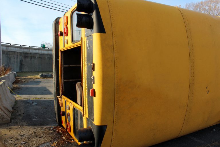 schoolbus tipped on its side