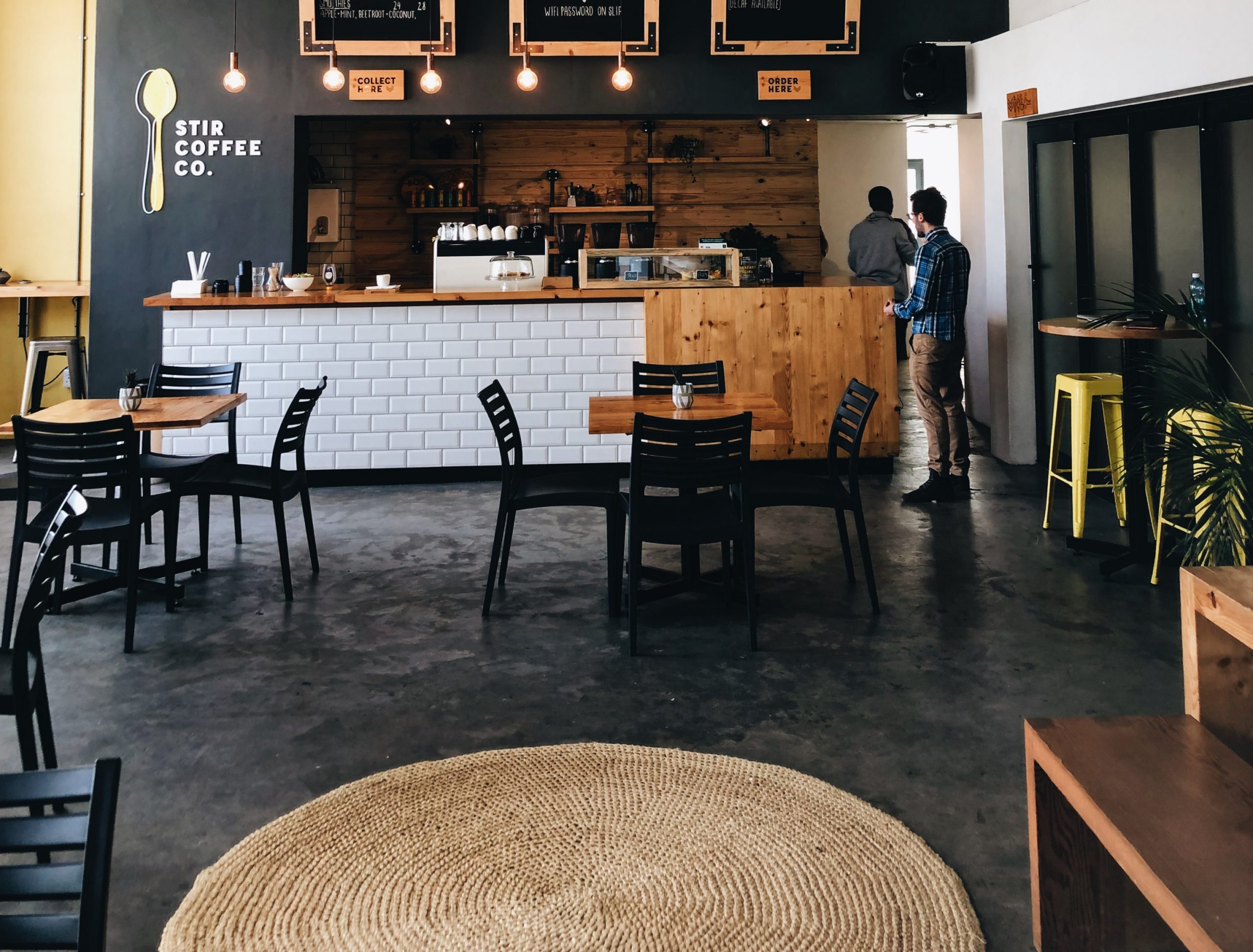 restaurant entrance with rug